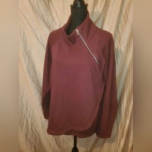 Athleta fleece lined sweatshirt with long sleeves and zip neck